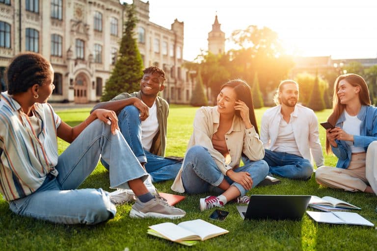 tudents on college campus discussing campus security measures and safety protocols